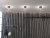 Bullo Plafond mattsvart/klar glas i en hall