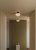 Bullo Plafond mattsvart/opal glas i en hall