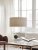 Pendel Soft Ø60 linne natur/metallic bronze över soffbord