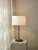 Bordslampa Soft Ø34 linne vit/metallic bronze i en hall